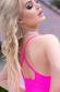 Mini abito fucsia con strass.