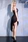 Babydoll nero in tulle con inserto in pizzo e bijoux.