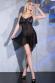 Babydoll nero in tulle con inserto in pizzo e bijoux.