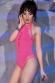 Body rosa acceso elasticizzato con stringature decorative.