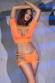 Top e shorts con intagli. Arancione