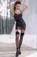 Chemise in pizzo e tulle con schiena scoperta e calze.