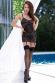 Chemise in pizzo e tulle con schiena scoperta e calze.