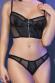 Top e slip in microrete e tessuto pitonato nero.