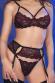 Set 4 pezzi in pizzo nero con ricami rossi e calze.