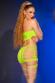 Top e pantaloncini con intagli. Verde neon