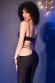 Top nero + leggings con dettagli dorati.